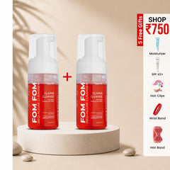 Two bottles of FOM FOM Rev Alg Acne Cleanser on a beige background with promotional text.